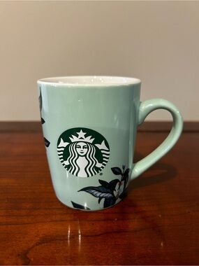 Starbucks Sage Green Ceramic Mug with Floral Accent. 10 oz.